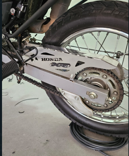 GUARDA CADENA EN ACERO HONDA XR150 ABS 2.0 - XR190L ABS 2.0 - XRE 190