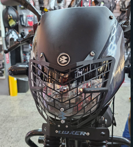PROTECTOR DE FAROLA EN ACERO BAJAJ BOXER CT