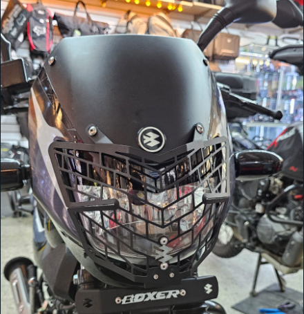 PROTECTOR DE FAROLA EN ACERO BAJAJ BOXER CT
