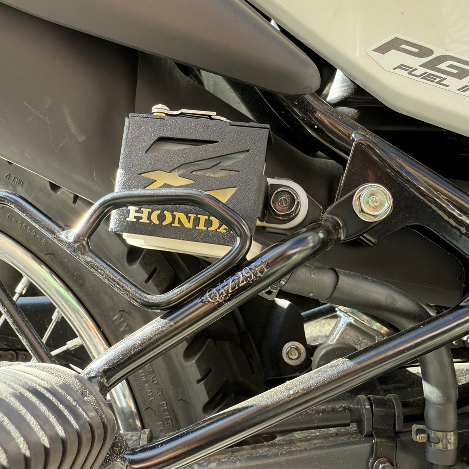 PROTECTOR DE BOMBA O DEPOSITO DE LIQUIDO DE FRENO TRASERO EN ACERO HONDA XR 190L ABS 2.0 - HONDA XRE 190 - HONDA CB190R 2.0 2025 - HONDA CB300F