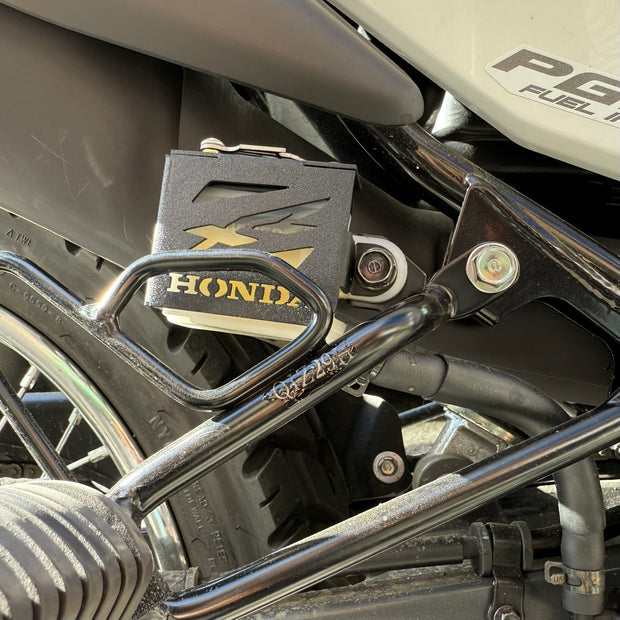 PROTECTOR DE BOMBA O DEPOSITO DE LIQUIDO DE FRENO TRASERO EN ACERO HONDA XR 190L ABS 2.0 - HONDA XRE 190 - HONDA CB190R 2.0 2025 - HONDA CB300F