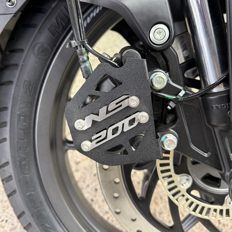 PROTECTOR DE CALIPER EN ACERO BAJAJ PULSAR NS 200 UG - BAJAJ PULSAR NS400Z