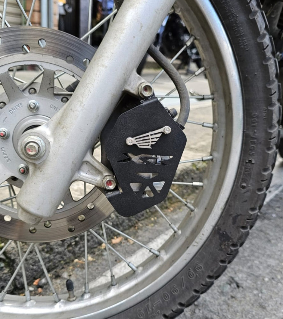 PROTECTOR DE CALIPER EN ACERO HONDA XR150 - XR190L