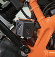 PROTECTOR DE BOMBA O DEPOSITO DE LIQUIDO DE FRENO TRASERO EN ACERO KTM DUKE 200/250/390 NG - KTM DUKE 200/390 G1