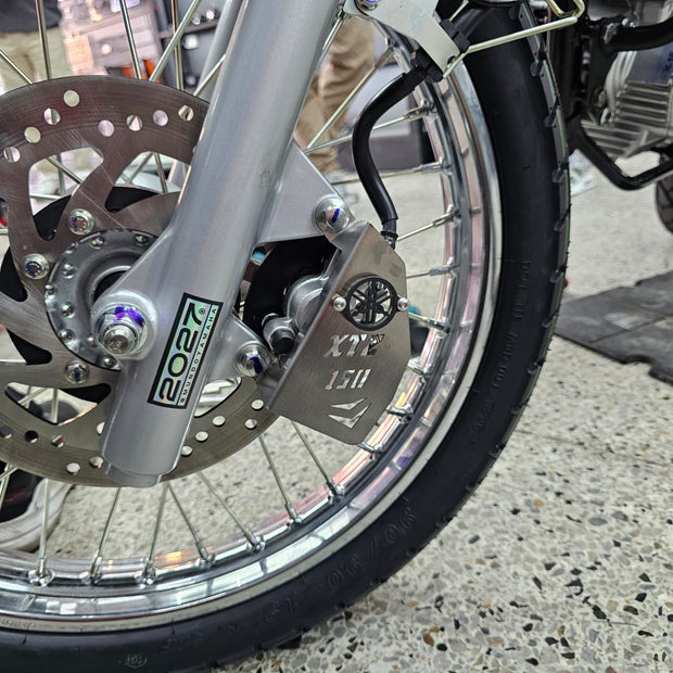 PROTECTOR DE CALIPER EN ACERO YAMAHA XTZ 150