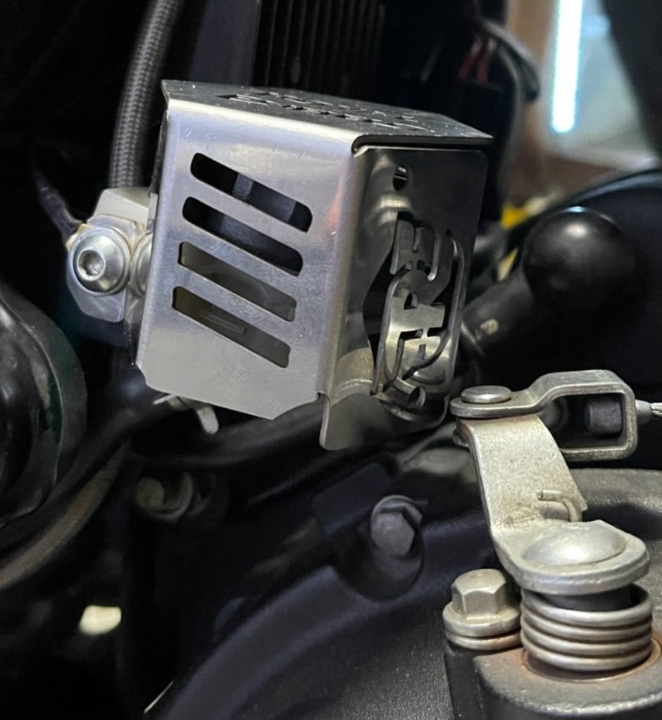 PROTECTOR DE BOMBA O DEPOSITO DE LIQUIDO DE FRENO TRASERO EN ACERO ROYAL ENFIELD HIMALAYAN/SCRAM 411