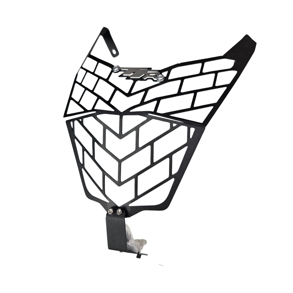 PROTECTOR DE FAROLA EN ACERO AKT TTR 2014/2024