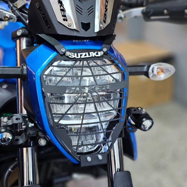 PROTECTOR DE FAROLA EN ACERO SUZUKI GIXXER 150 FI - GIXXER 250 FI